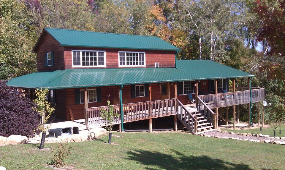 Homes and cabins gutter project by Premier Seamless Gutters