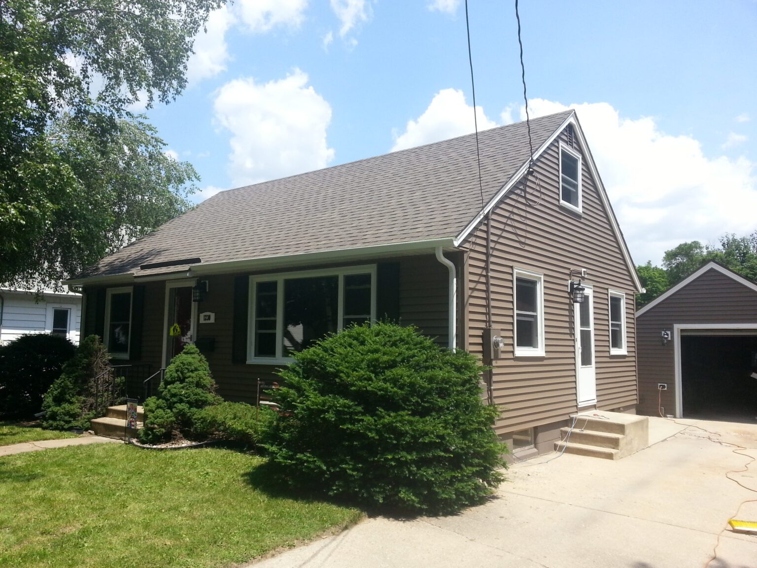 Homes and cabins gutter project by Premier Seamless Gutters