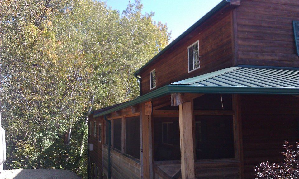 Homes and cabins gutter project by Premier Seamless Gutters